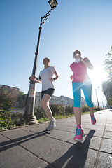 Image showing female friends jogging