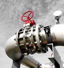 Image showing Industrial zone, Steel pipelines and valves against blue sky