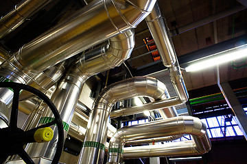 Image showing Equipment, cables and piping as found inside of a modern industr