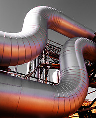 Image showing Industrial zone, Steel pipelines at sunset