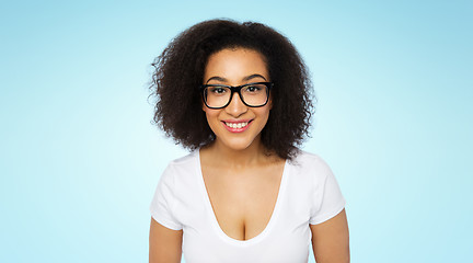 Image showing happy african woman or student girl in eyeglasses