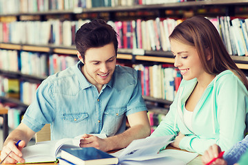 Image showing students with books preparing to exam in library