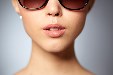 Image showing close up of beautiful woman in black sunglasses