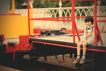 Image showing smiling boy with a backpack