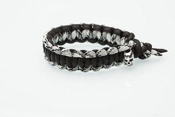 Image showing Black braided bracelet on white background