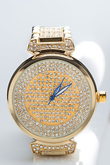 Image showing gold watch with diamonds