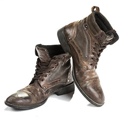 Image showing Dirty old boots isolated. white background