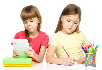 Image showing Children with tablet and color pencils