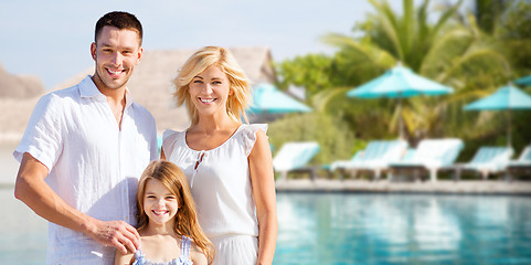 Image showing happy family over hotel resort swimming pool