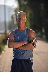 Image showing portrait of handsome senior jogging man