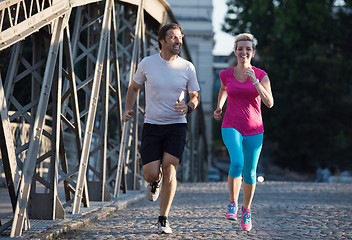 Image showing couple jogging