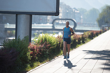 Image showing handsome senior man  jogging