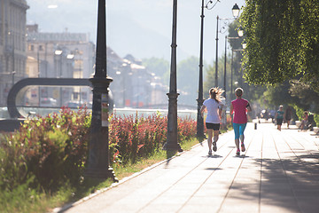 Image showing female friends jogging