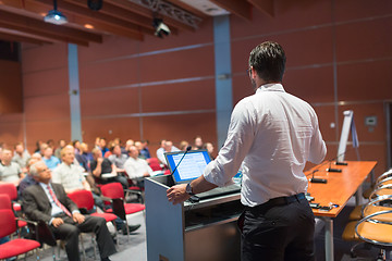 Image showing Public speaker giving talk at Business Event.