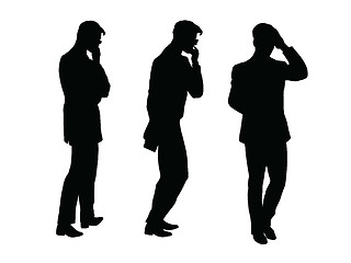 Image showing Male businessman thinks goes black silhouette figure