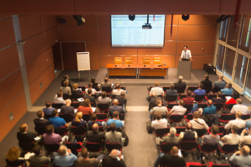 Image showing Business speaker giving a talk in conference hall.