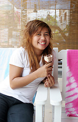 Image showing Girl eating icecream