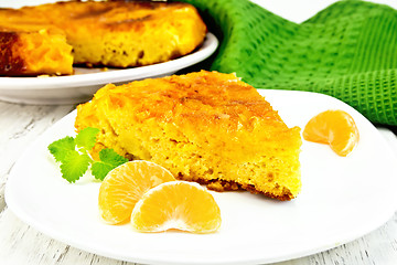 Image showing Pie mandarin with mint and napkin on board