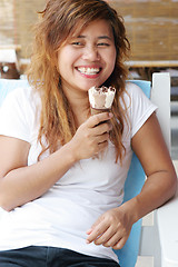 Image showing Girl eating icecream