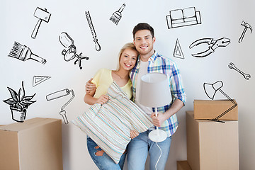 Image showing happy couple with stuff moving to new home