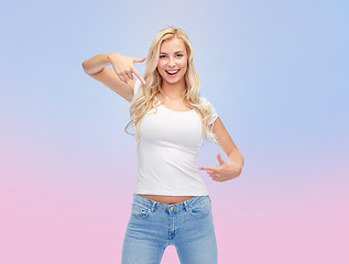 Image showing happy young woman or teenage girl in white t-shirt