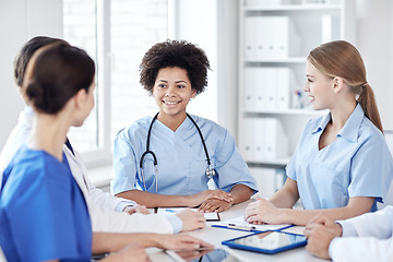 Image showing group of happy doctors meeting at hospital office