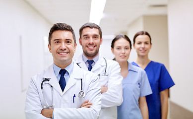 Image showing group of happy medics or doctors at hospital