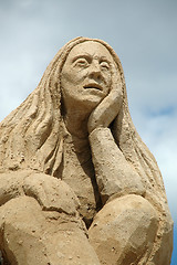 Image showing Sad sand woman