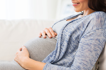 Image showing close up of happy pregnant woman at home