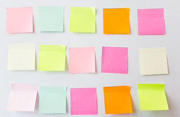 Image showing close up of blank paper stickers on white board