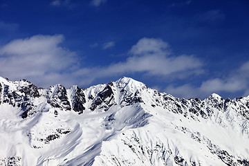 Image showing View on snowy mountains in sunny day