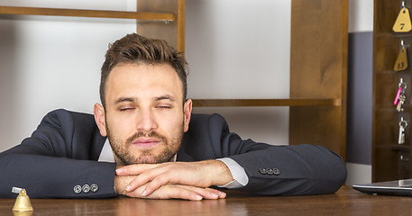 Image showing Portrait of a Tired Receptionist