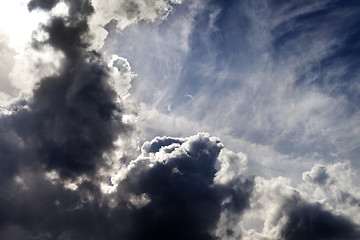 Image showing Sunlight sky with dark storm clouds