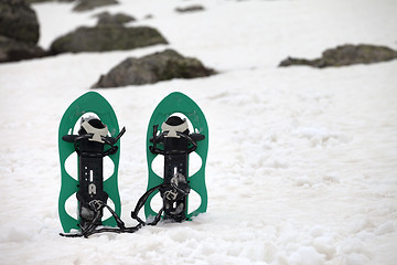 Image showing Snowshoes in snowy mountains