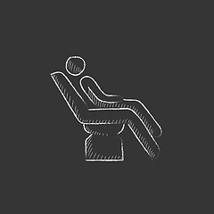 Image showing Man sitting on dental chair. Drawn in chalk icon.