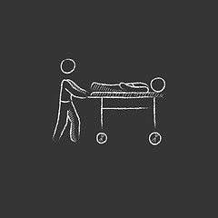 Image showing Man pushing stretchers. Drawn in chalk icon.