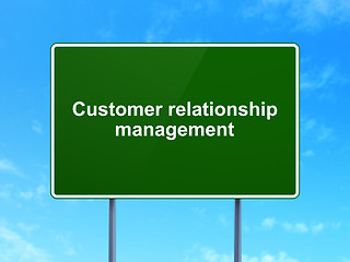 Image showing Advertising concept: Customer Relationship Management on road sign background