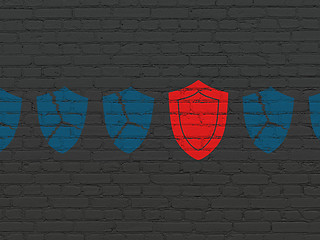 Image showing Privacy concept: shield icon on wall background