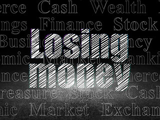 Image showing Money concept: Losing Money in grunge dark room