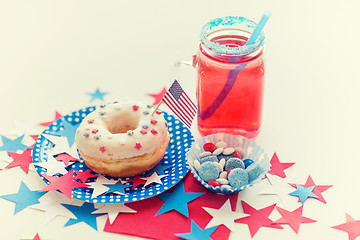 Image showing donut with juice and candies on independence day