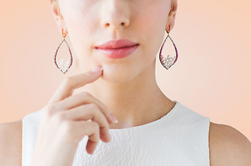 Image showing close up of beautiful woman face with earrings