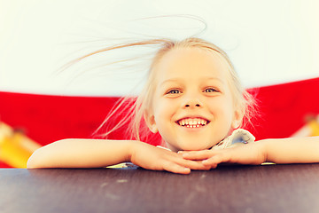 Image showing happy little girl climbing on children playground