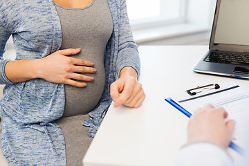 Image showing close up of doctor and pregnant woman at hospital