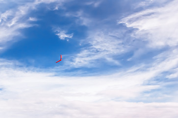 Image showing Red boomerang in flight