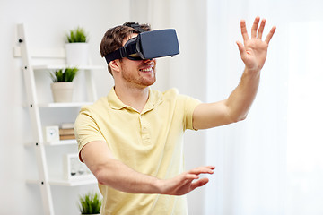 Image showing young man in virtual reality headset or 3d glasses