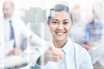 Image showing group of smiling businesspeople meeting in office