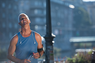 Image showing portrait of handsome senior jogging man