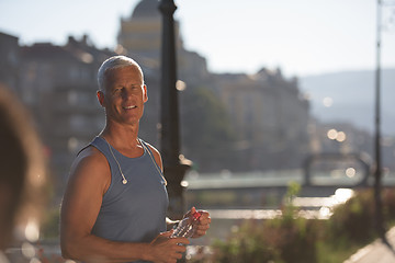 Image showing portrait of handsome senior jogging man