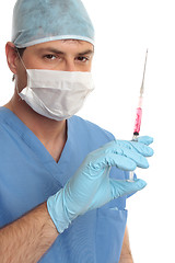 Image showing Surgeon haematologist  in scrubs with syringe needle