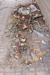 Image showing Vityazevo, Russia - April 2, 2016: Garbage building and home to the paving tiles in the nook